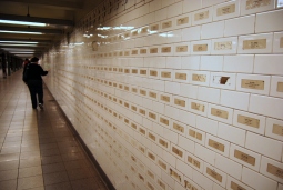 Union Square subway: Names of the 9/11 victims (artist unknown). The woman in this photo was in my tour group, and she was scanning the names (which were in alphabetical order) for the name of her cousin. When she found him, we had all caught up, and a quiet and teary moment came over our small group.